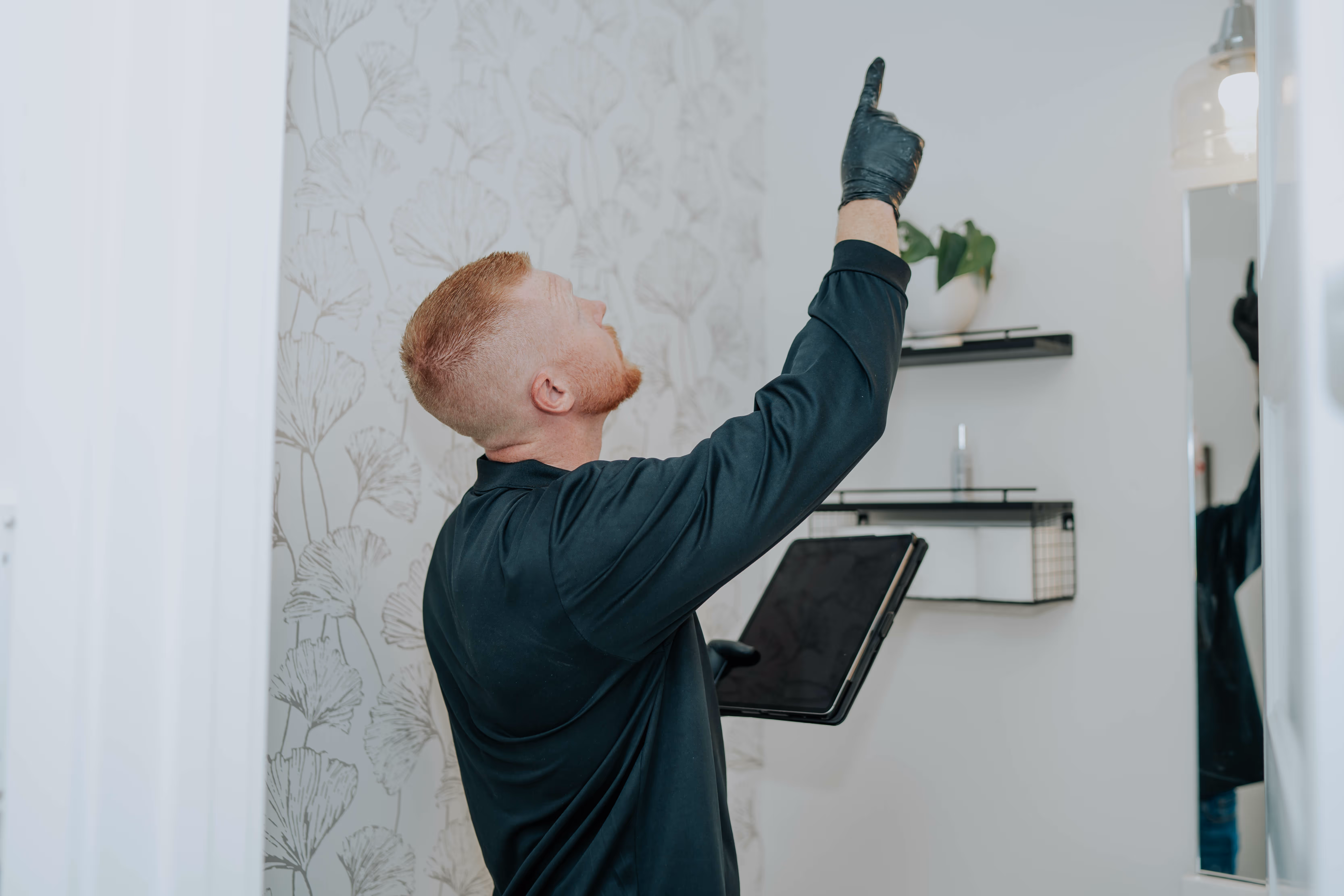 Pure Air Alabama specialist inspecting a property